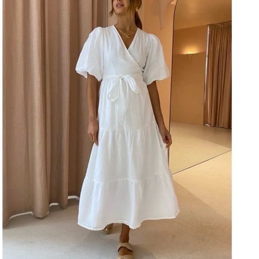Faithfull the Brand white wrap dress in a size 4.